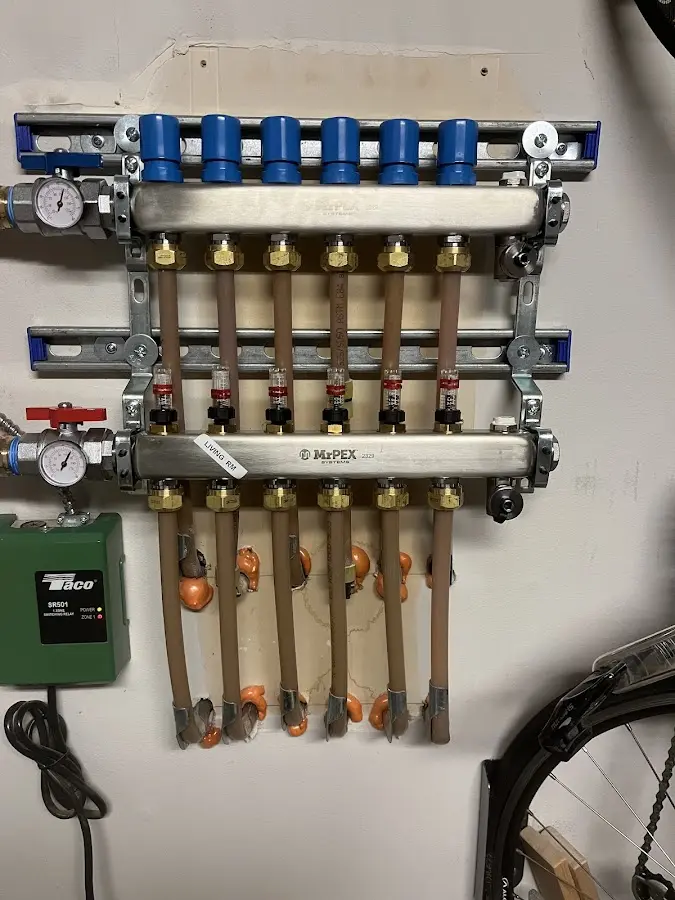 Plumber performing Gas Leak Detection at a residential property in Northwood